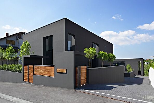 Fachadas de casas de color gris oscuro
